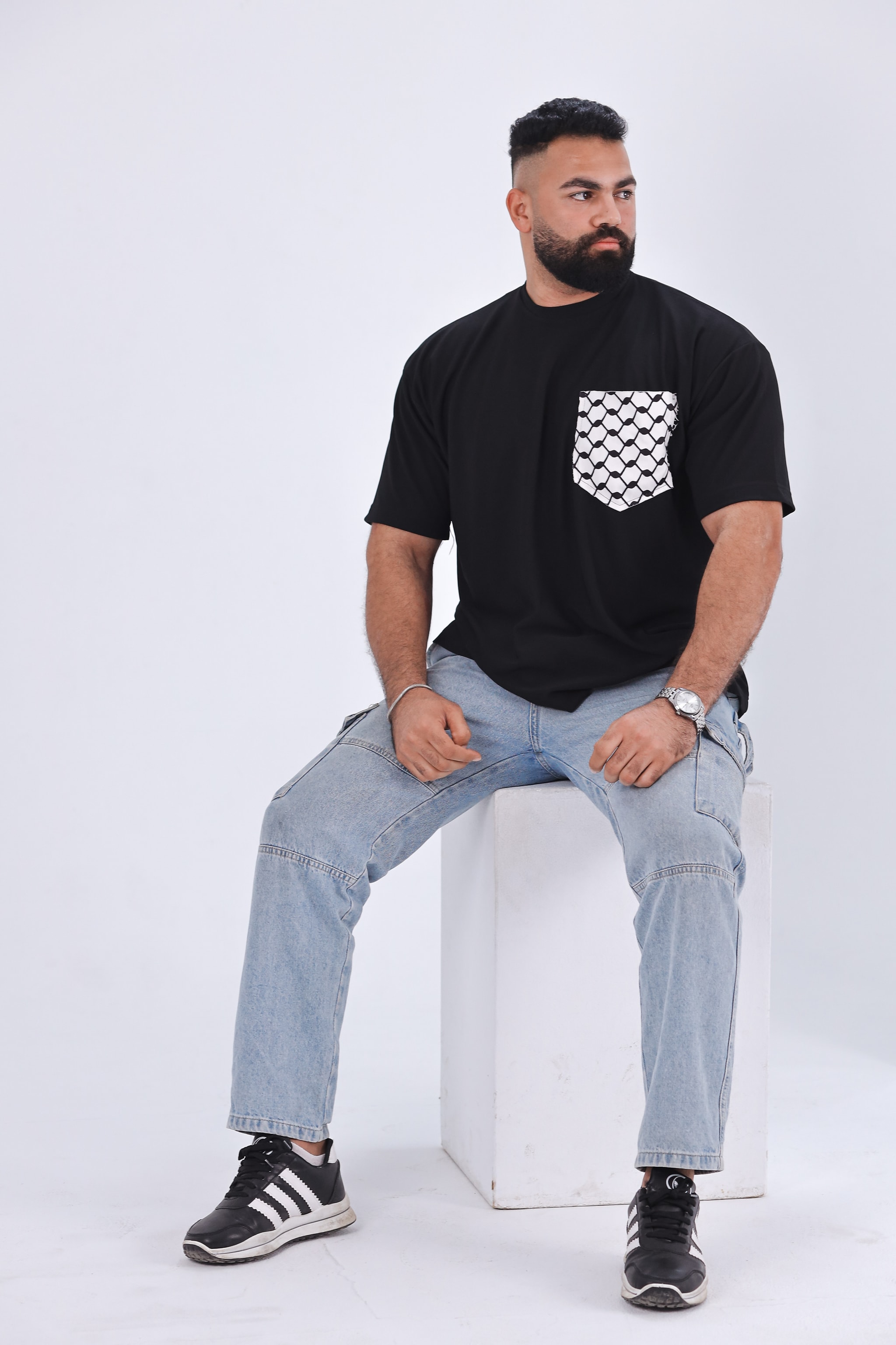 Black T-Shirt with Kufiya-Patterned Pocket - View 1